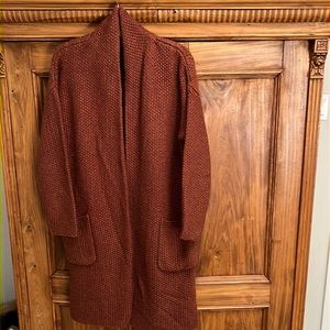 Medium weight rust colored knit 3/4 length cardigan